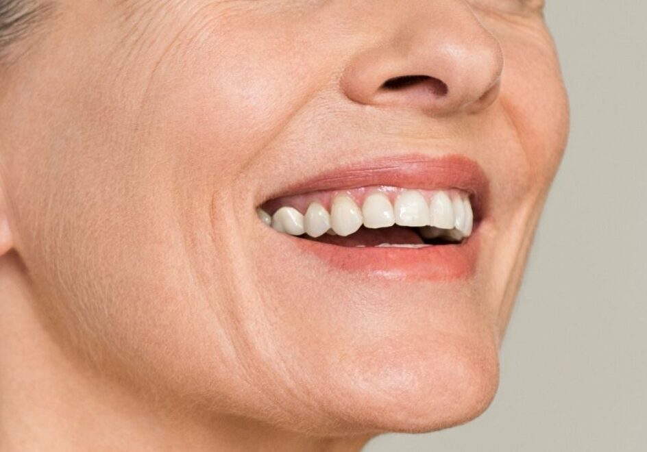 Close-up of a mature adult smiling naturally